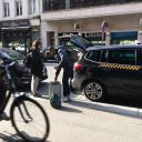 Fietsers en taxi's Antwerpen